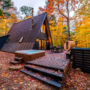 An A-Frame Cabin Design Idea that Includes Modern  Traces